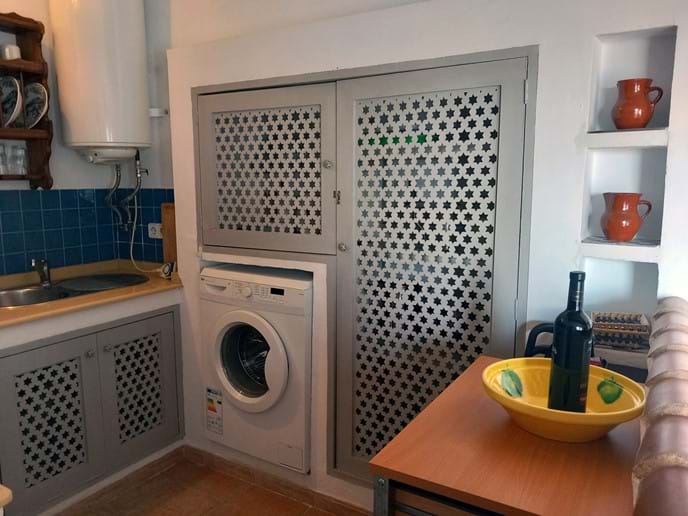 Holiday let Casa Vista Castillo has a well Equipped Kitchen with Washing Machine Photo