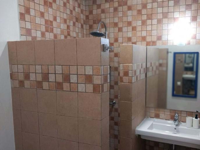 Bathroom with Walk-In Shower at holiday rental Casa Vista Castillo in Arcos de la Frontera Photo