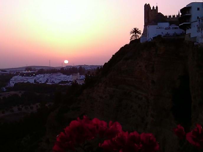 Sunet view of Arcos de la Frontera´s Moorish castle from the terrace at Casa Vista Castillo Photo
