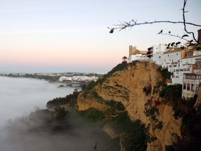 Misty morning view of Arcos de la Frontera´s moorish castle from Casa Vista Castillo Photo