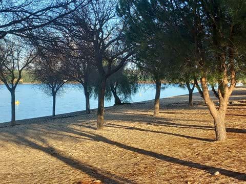 The sandy lakeside beach in Arcos de la Frontera Photo