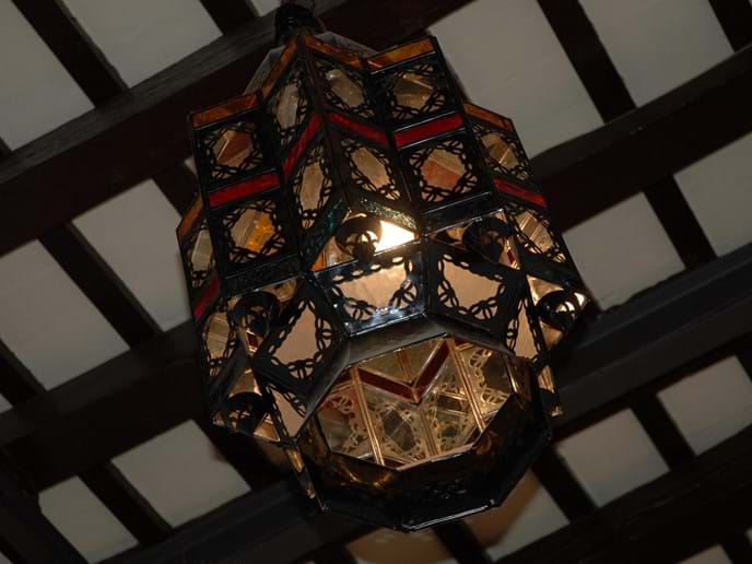 Large Moroccan lantern on beamed ceiling at holiday let Casa Vista Castillo in Arcos de la Frontera Photo