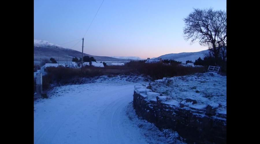 View down the lane in the snow