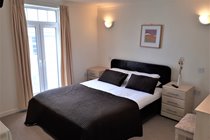 Master Bedroom with En-Suite Shower Lodge 34,  at Atlantic Reach Resort. www.newquay-selfcatering.com