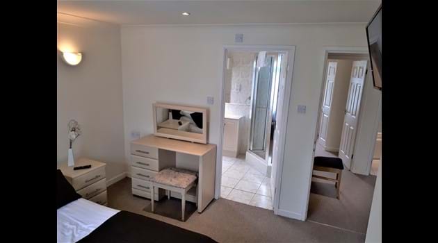 Master Bedroom with En-Suite Shower Lodge 34,  at Atlantic Reach Resort. www.newquay-selfcatering.com
