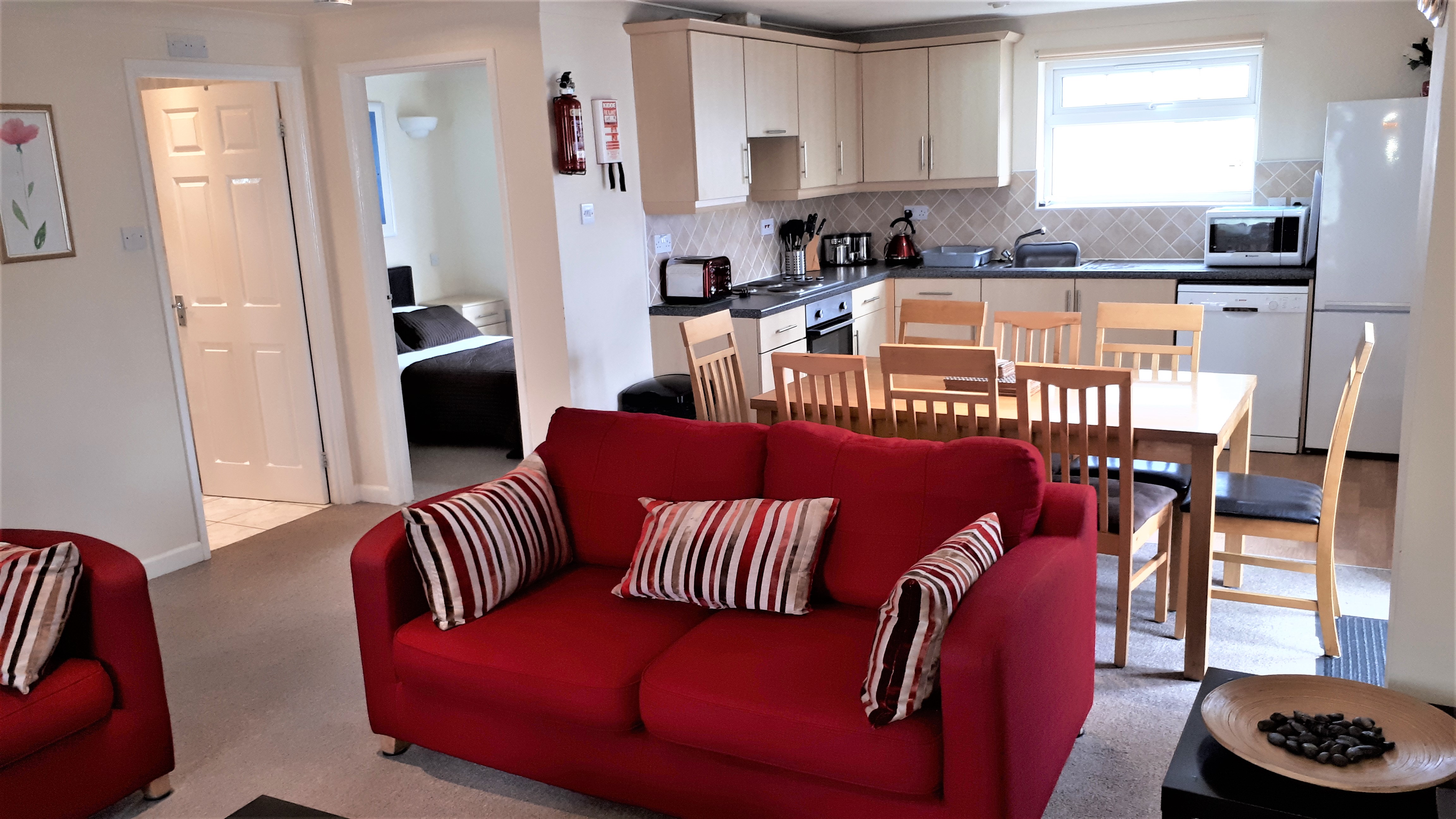 Lodge 34 Open plan Lounge, Dining, Kitchen at Atlantic Reach Resort. www.newquay-selfcatering.com