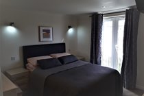 Master Bed Room with En-Suite Bath and Smart tv. AG35