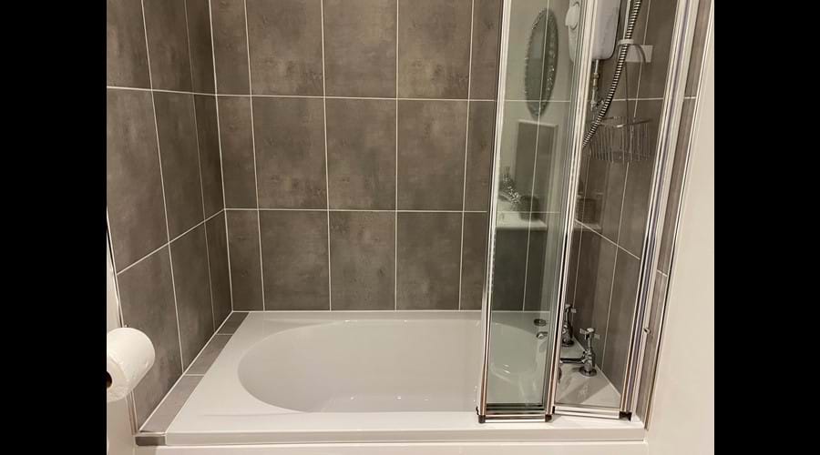 Bath with overhead shower