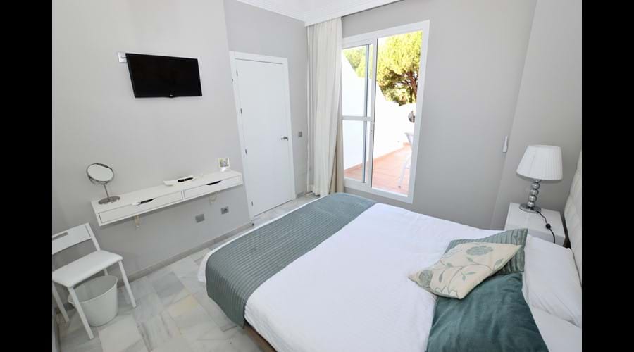 Master bedroom doors to upper sun terrace