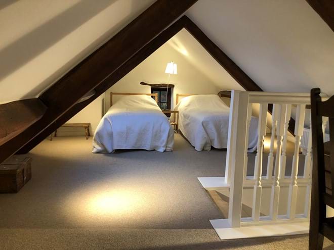 Galleried loft room with two single beds