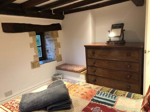 King size bedroom no.1 with exposed beams