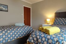 Main Bedroom - Single beds can be joined together on request to make a king size double.