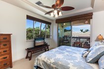 Master suite with a private upstairs lanai on which to enjoy your morning Kona coffee