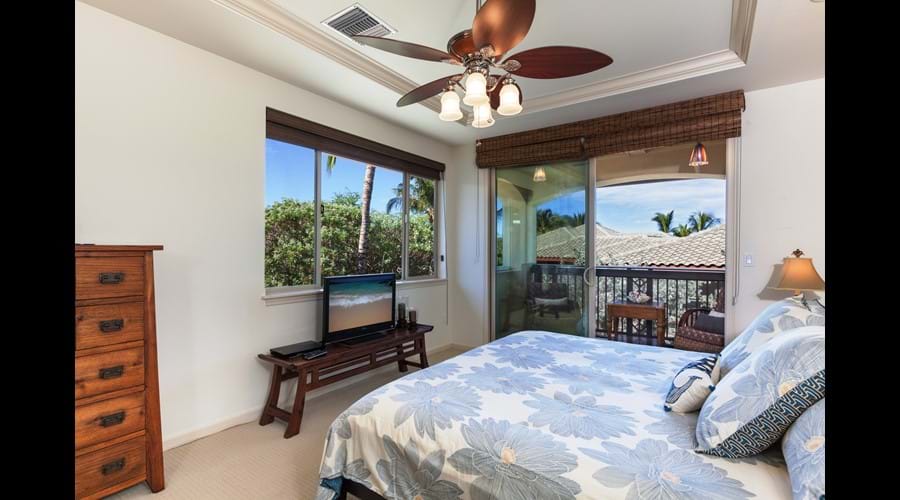 Master suite with a private upstairs lanai on which to enjoy your morning Kona coffee