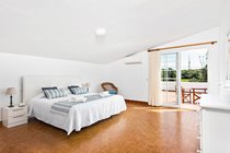 Master bedroom (AC) + shared en-suite with private terrace ideal for morning coffee