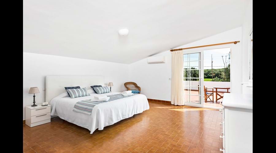 Master bedroom (AC) + shared en-suite with private terrace ideal for morning coffee