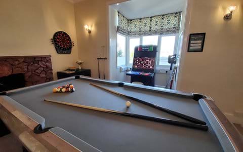 Pool table, electronic darts and retro arcade machine