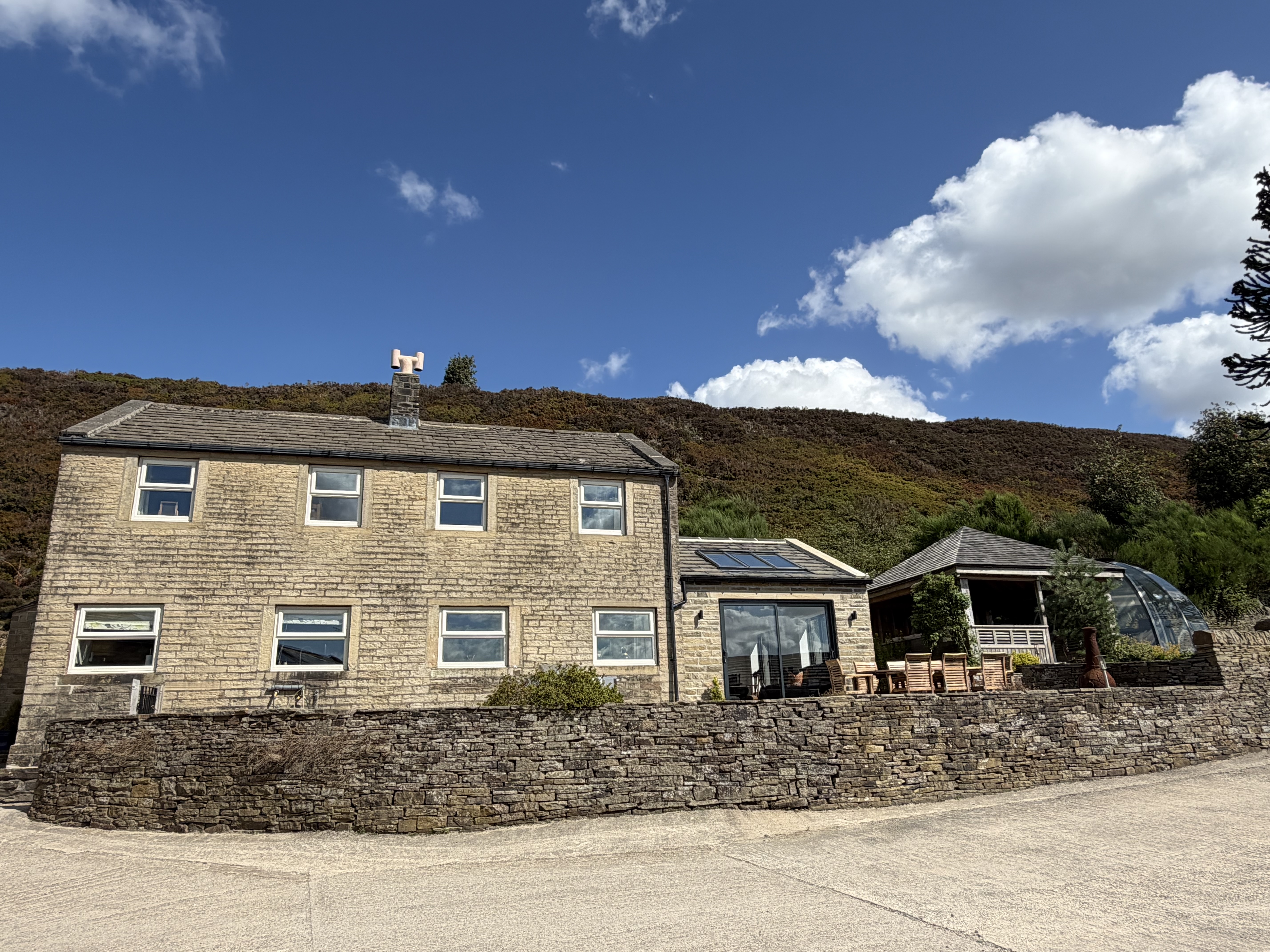 Outside phot including new garden room 