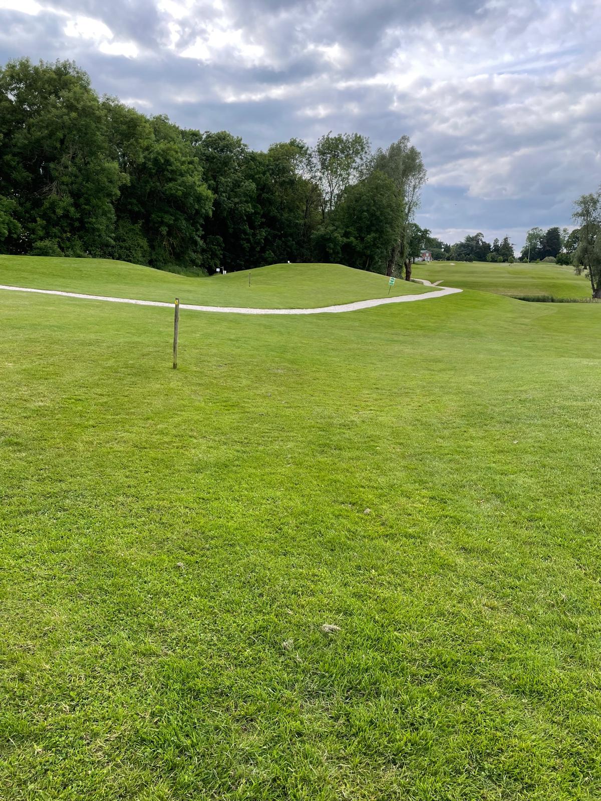 Follow public footpath signs across the golf course