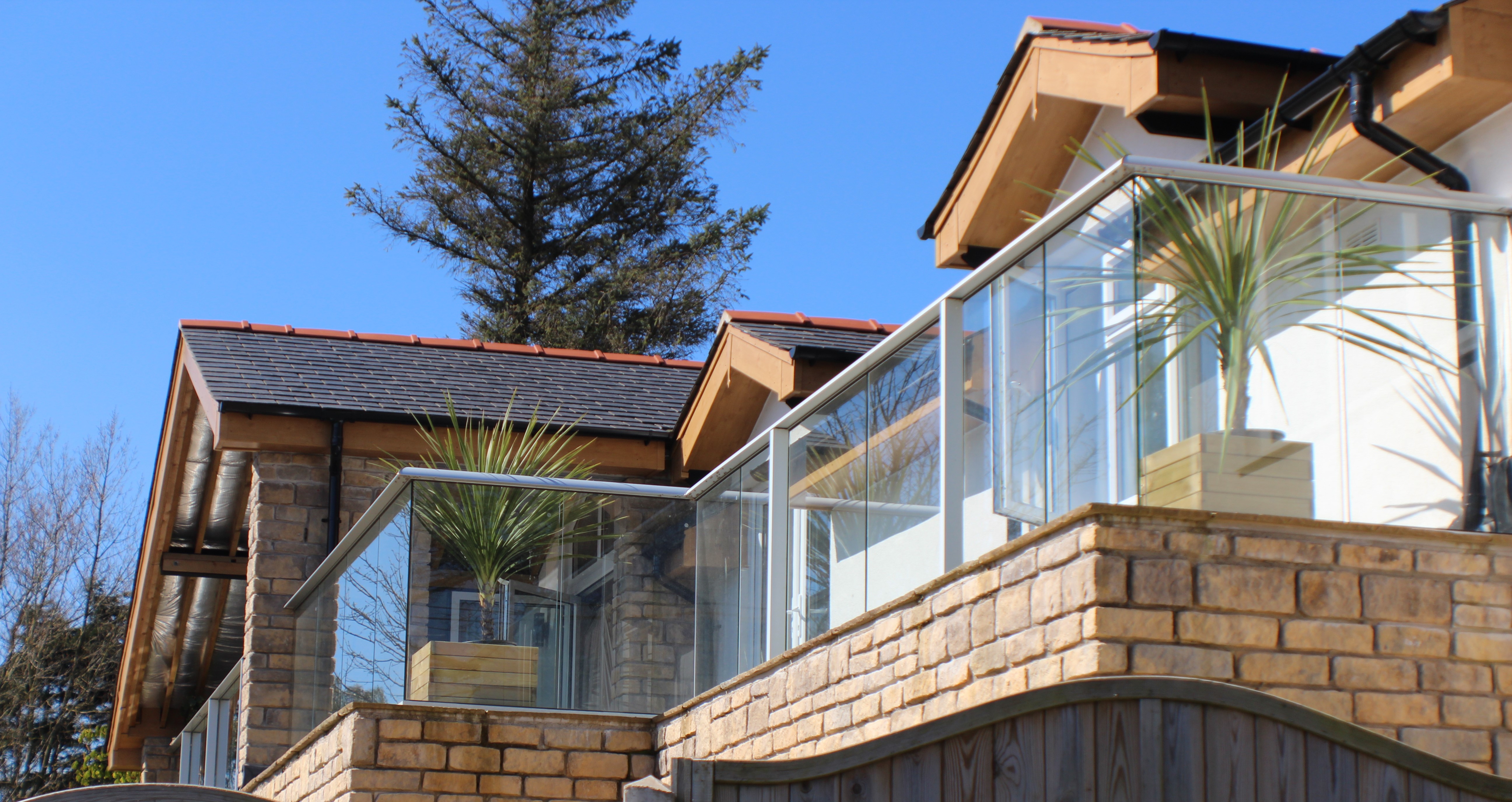 A picture of an uncovered balcony, taken from below.