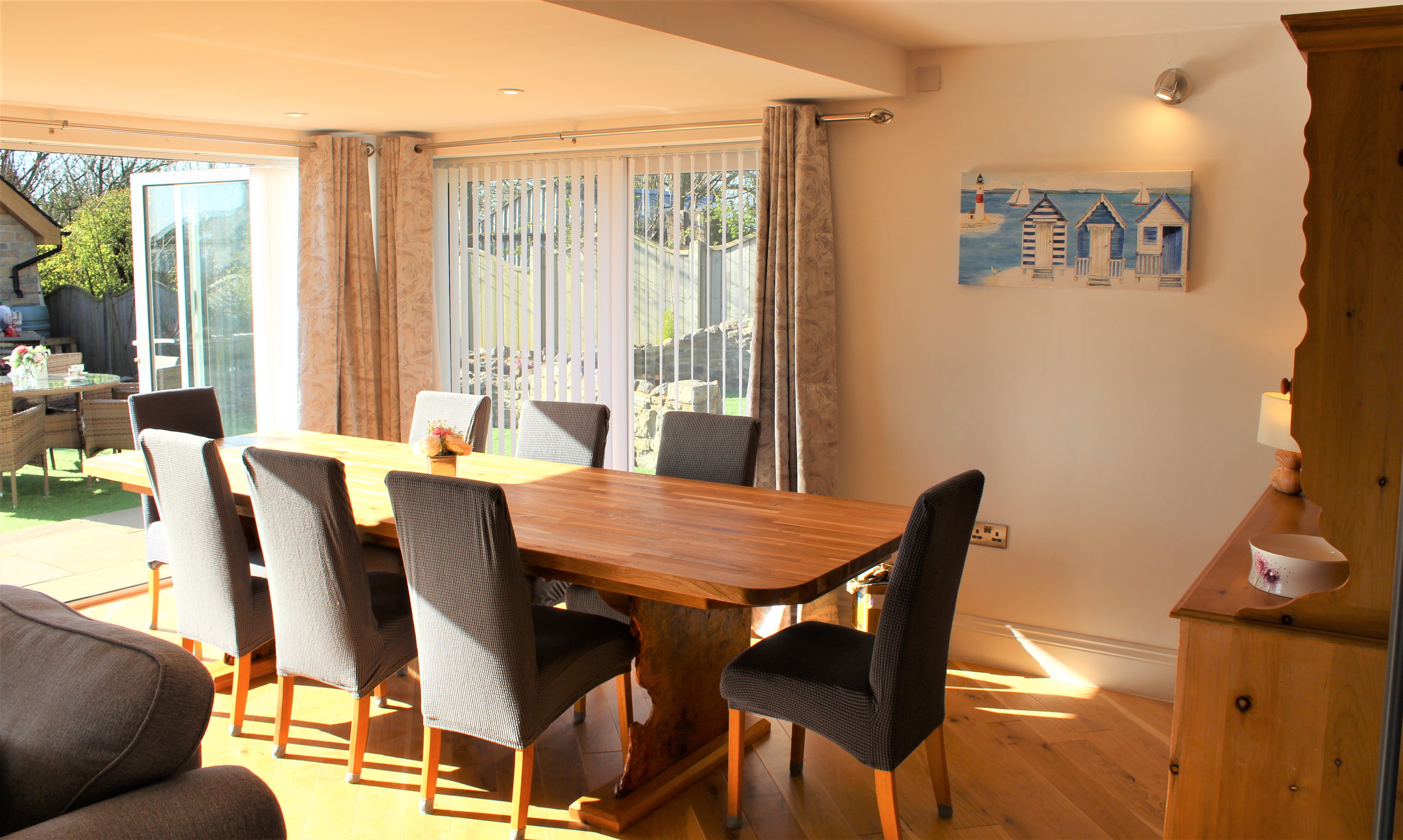 A view of the dining area with the back door open.