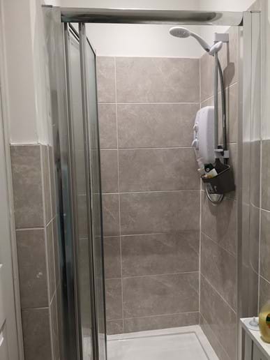 The shower is a walk in one, ideal for those who aren