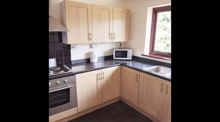 Bright, spacious kitchen inc washing machine, fridge freezer and airfryer