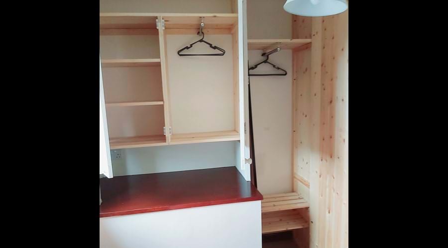Double wardrobe and shelf storage in cosy double