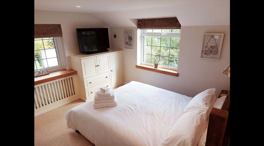 Main bedroom with dual aspect of country views