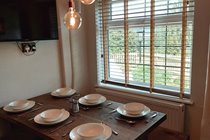 Dining area overlooking the patio and valley