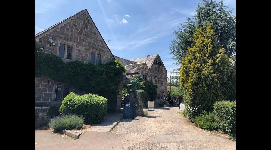 The Old Court serves an extensive menu and has a lovely sun-trap rear garden and cosy bar with fire