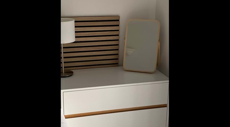 White and wood decor for the third bedroom