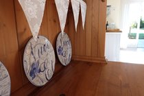 French dresser in the large kitchen looking towards the French windows and terrace