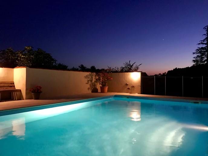 The peaceful pool ready for a midnight dip under a starry sky