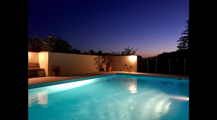 The peaceful pool ready for a midnight dip under a starry sky