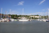 The pretty port of Mortagne sur Gironde with restaurants along the quay offering the local freshly caught fish