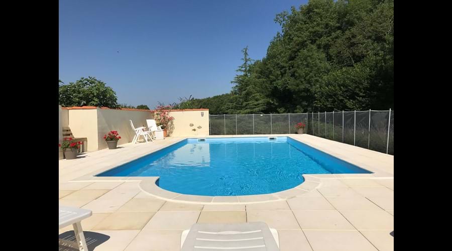 The private, sheltered, heated, salt water pool area for swimming from May to September