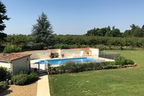 View from upstairs of the private, sheltered pool area with farmer