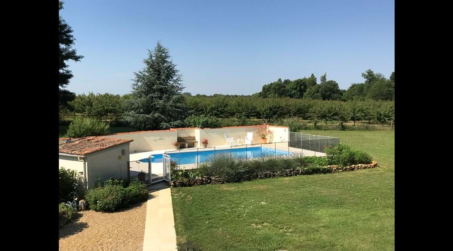 View from upstairs of the private, sheltered pool area with farmer