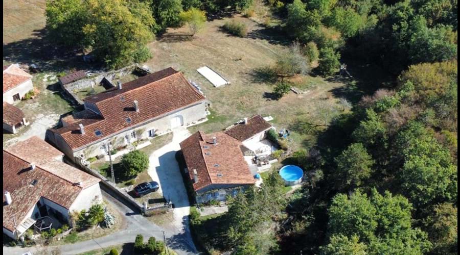 Aerial view of our property and the Gite in the foreground