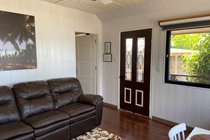 Living area West Wing Apartment Waves Beach House