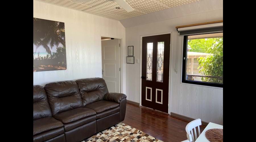 Living area West Wing Apartment Waves Beach House