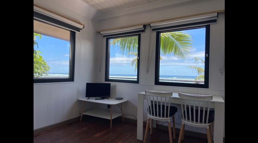 Living area West Wing Apartment Waves Beach House