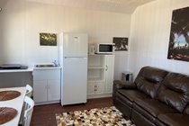 Living area West Wing Apartment Waves Beach House