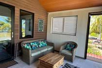 Relaxation area on outdoor deck of villa
