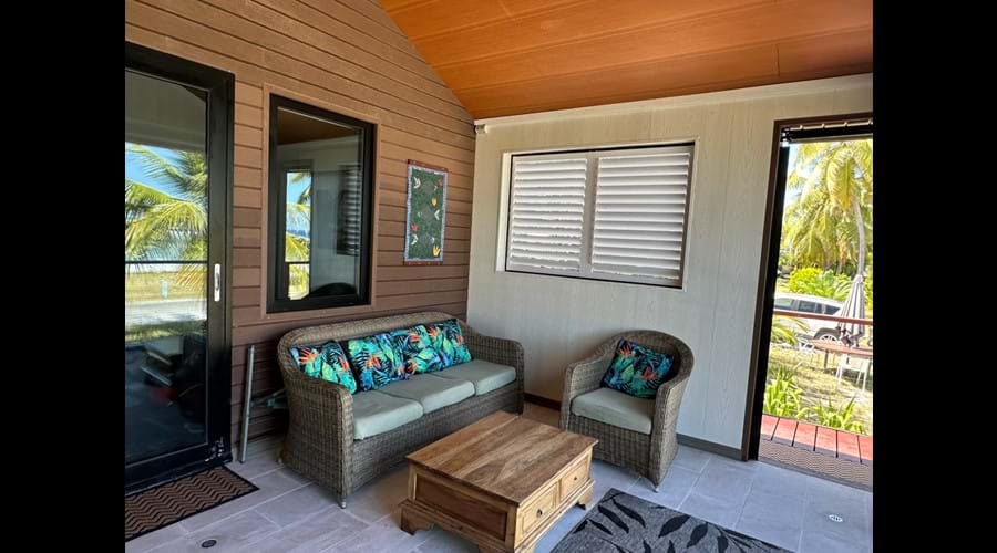 Relaxation area on outdoor deck of villa