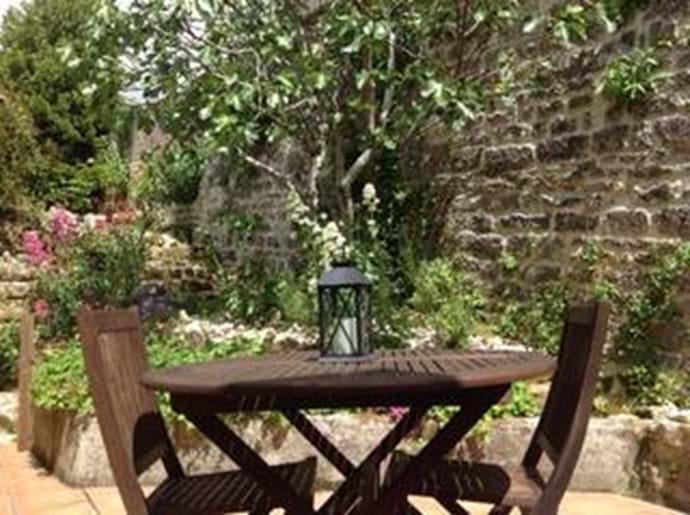 The terrace outside Fig Tree Cottage