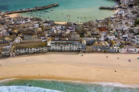 Porthmeor Beach and St Ives Harbour