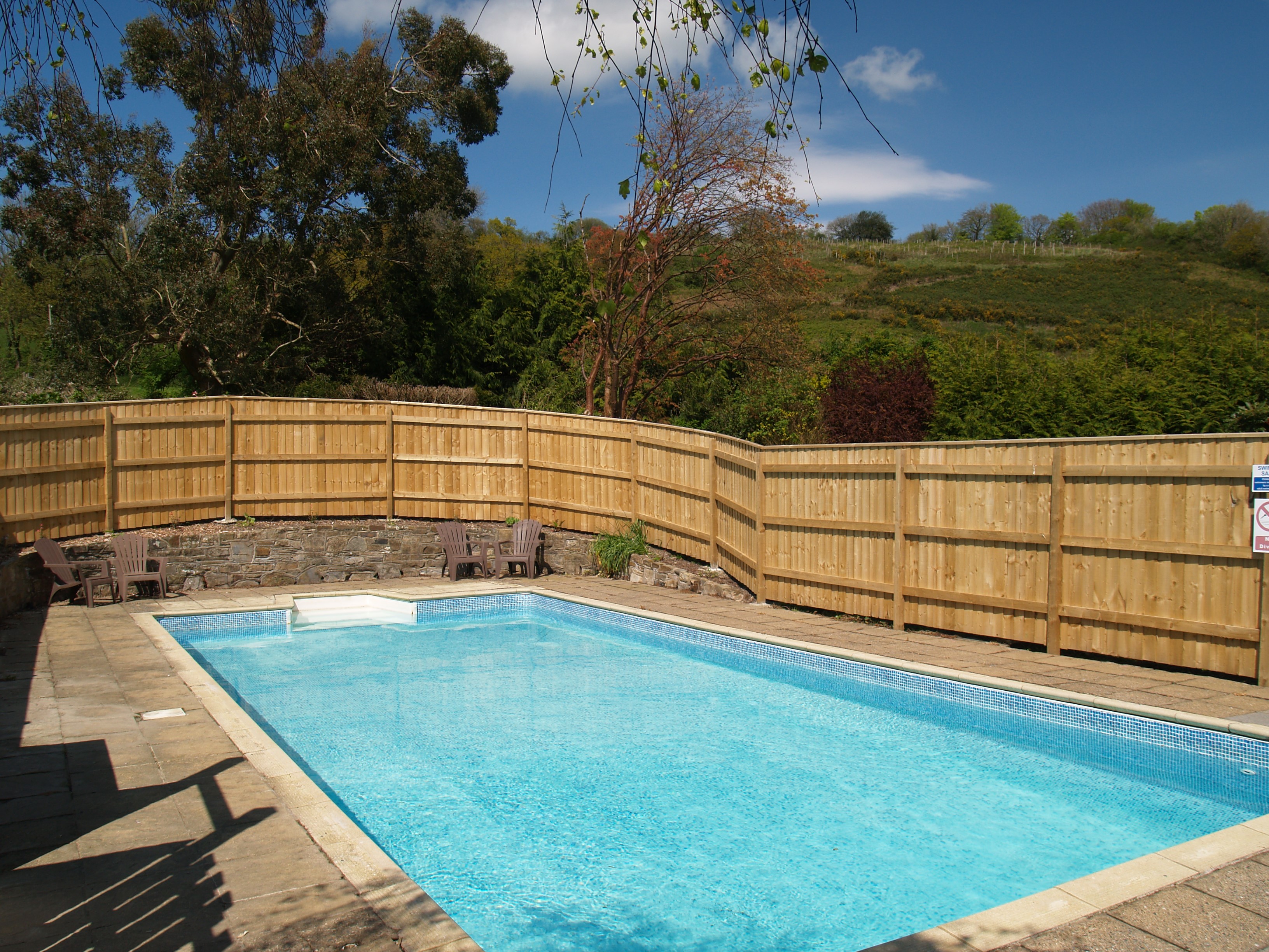 outdoor heated pool for relaxing after work