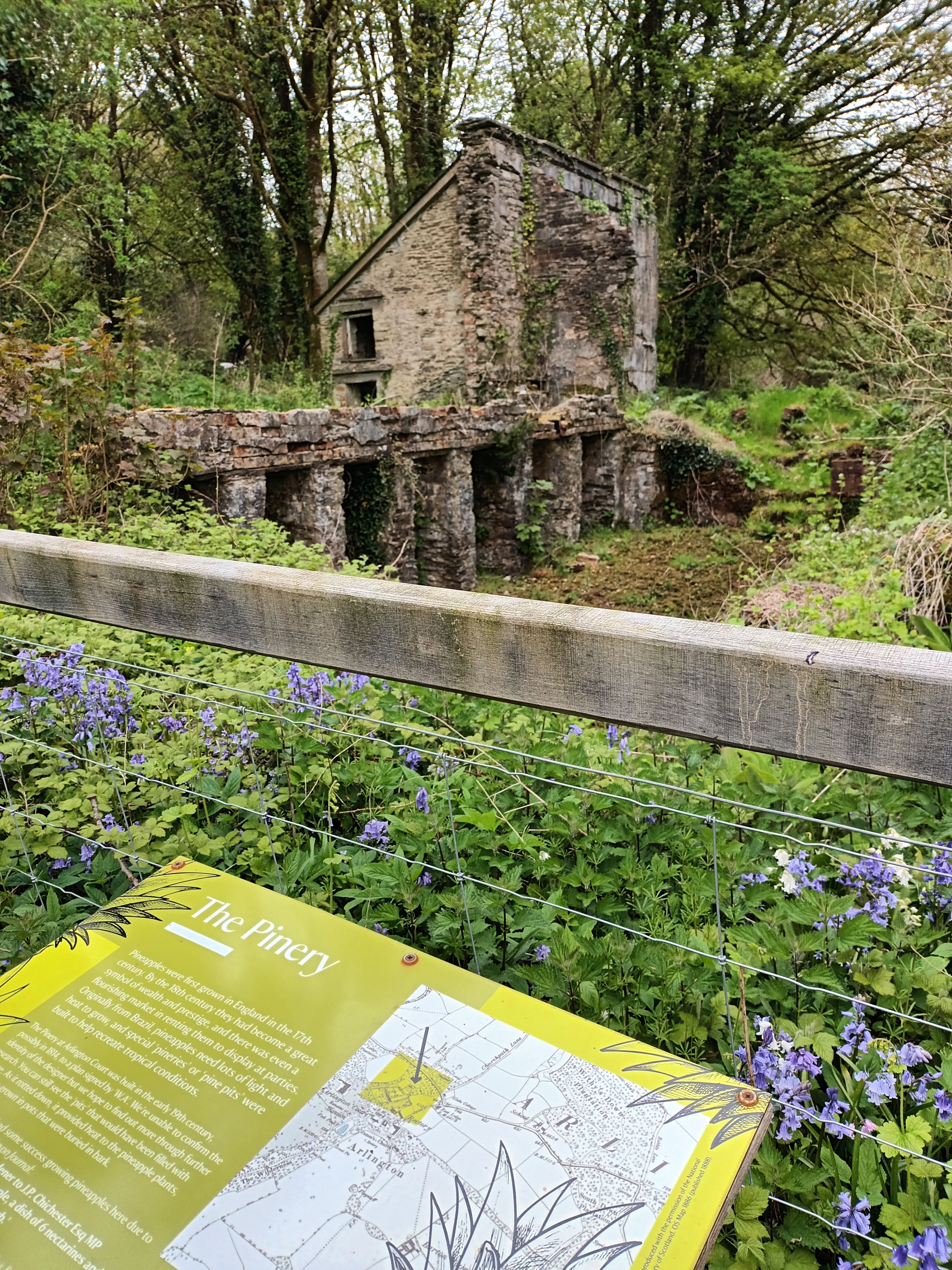 An information board in front of The Pinary building at Arlington Court